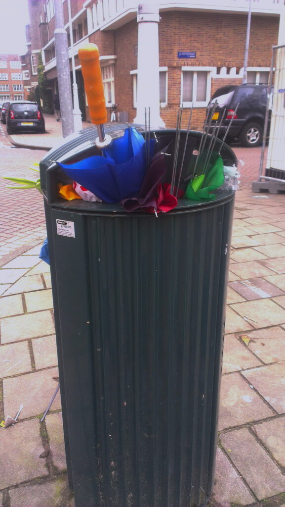 2 binned brollies, very colourful (bright blue red and green). Also some binned tulips to finish it of.